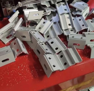 punched and cut aluminum profiles for solar mounting brackets and clamps