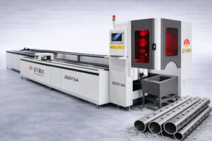 Laser tube cutting machine in a metal fabrication workshop processing steel tubes