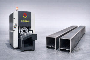 Laser tube cutting machine processing metal tubes in a modern manufacturing workshop